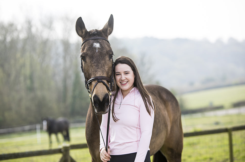 Horse rider wearing base layer with zip